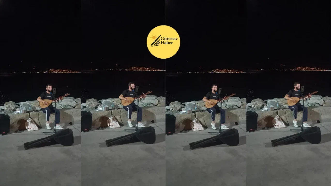 **Kartal Sahili'nde Serkan Rüzgârı: Sokak Şarkıcısı Şarkılarıyla Gönülleri Fethetti** 🎶