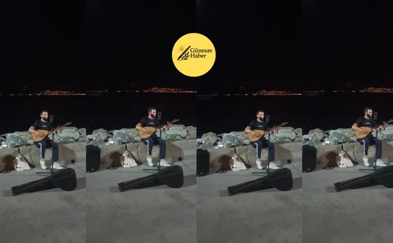 **Kartal Sahili'nde Serkan Rüzgârı: Sokak Şarkıcısı Şarkılarıyla Gönülleri Fethetti** 🎶